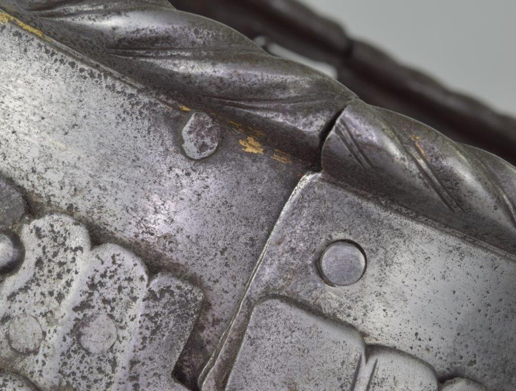 gorget details showing the uppper plate, roll, hinges and pins