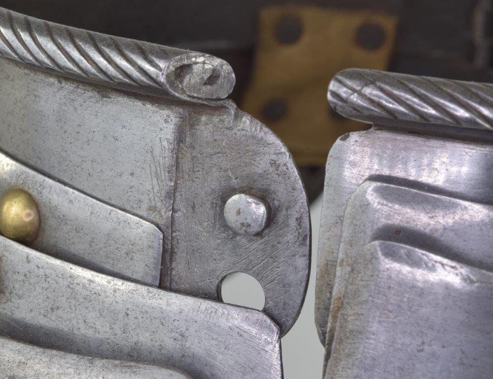 gorget details showing the uppper plate, roll, hinges and pins
