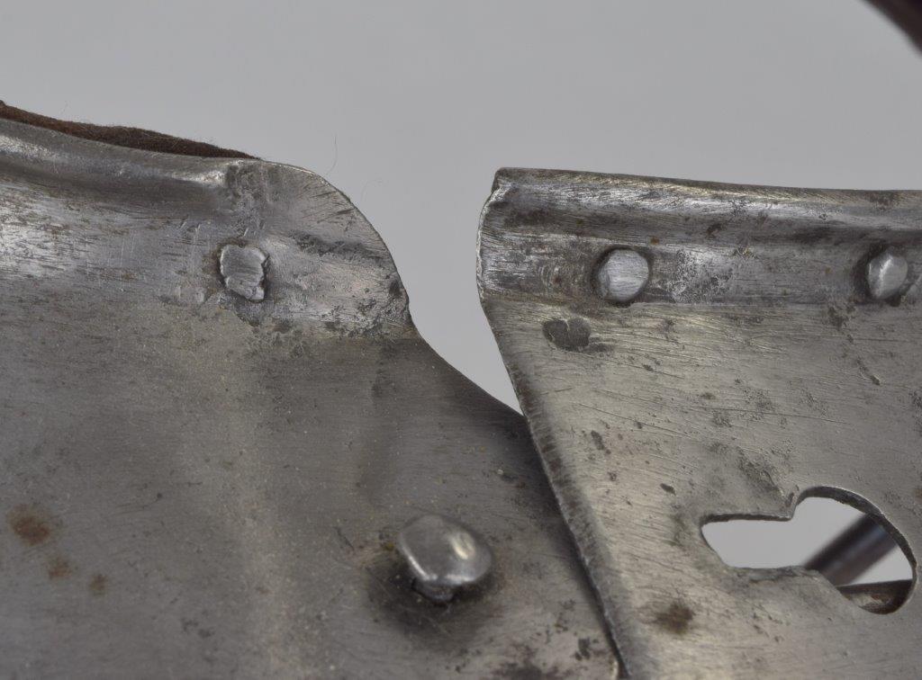 gorget details showing the uppper plate, roll, hinges and pins