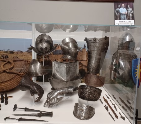 The antique pieces in place in the museum in the 36x36x26.5 display case.